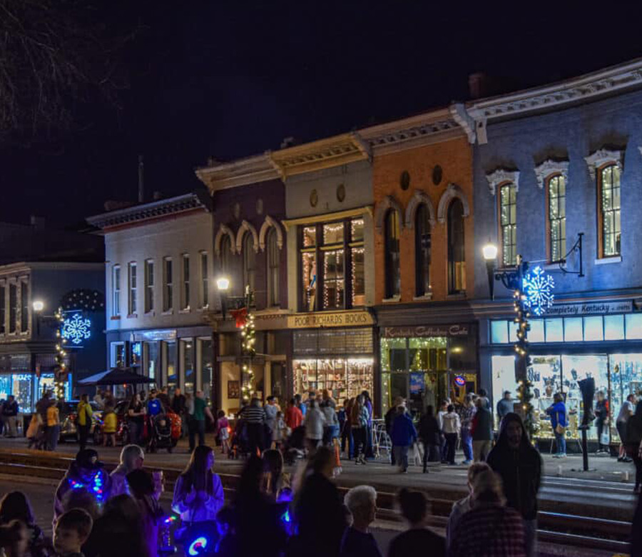 Image of downtown Frankfort KY lit up at night during the Candlelight celebration.